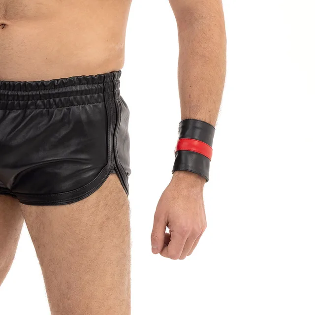 Prowler RED large striped wrist wallet worn beside black leather shorts