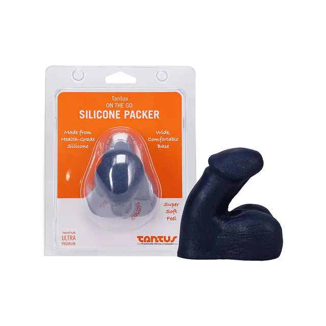 Tantus On The Go sapphire silicone packer beside front retail package
