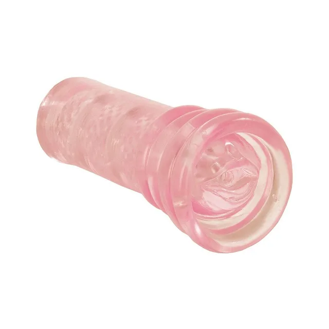 Adam & Eve Super Head Honcho pink stroker angled tunnel opening close-up
