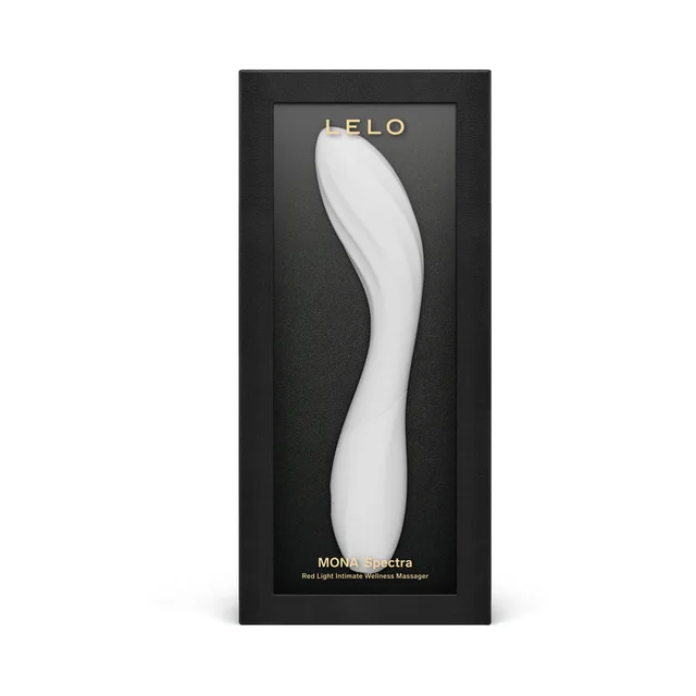 LELO Mona Spectra light pink curved LED massager inside the tall black retail box