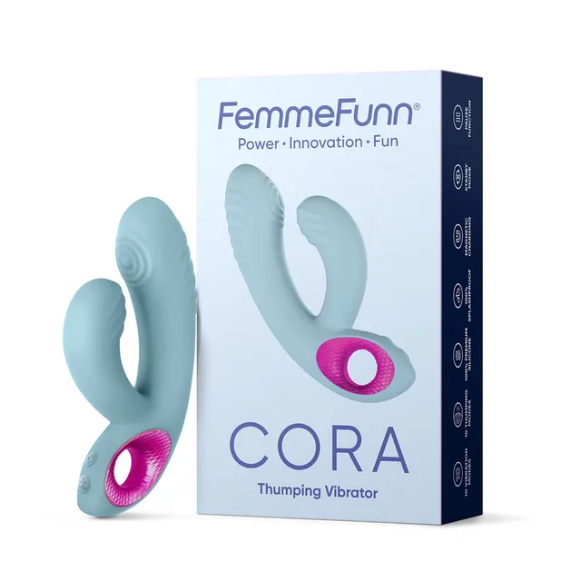 Light blue FemmeFunn Cora vibrator standing beside retail box