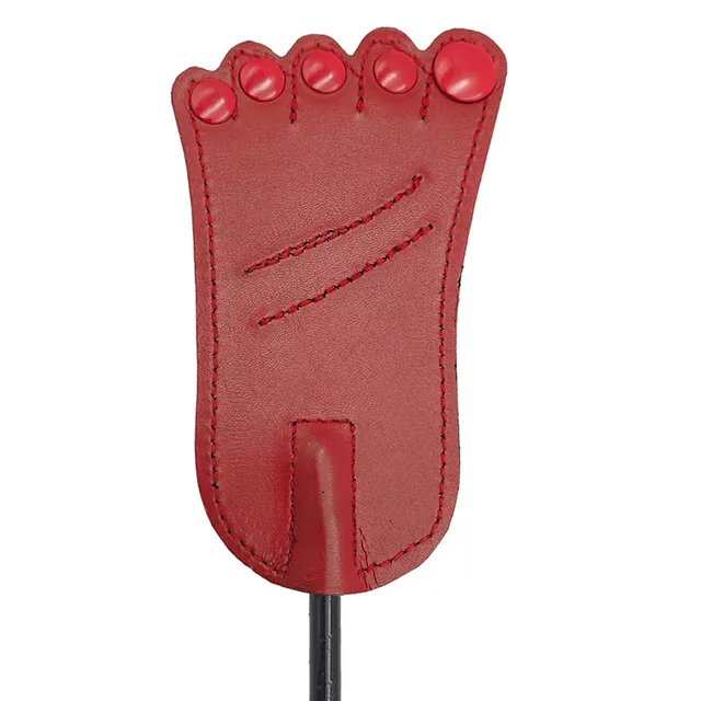 Rouge red leather foot-shaped riding crop close-up of the stitched five-toe tip