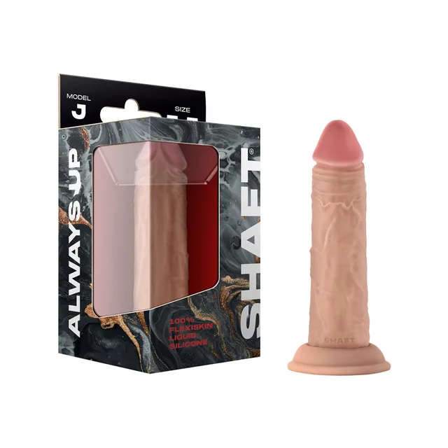 pine-toned Shaft Model J 5.5-inch textured dildo beside retail box