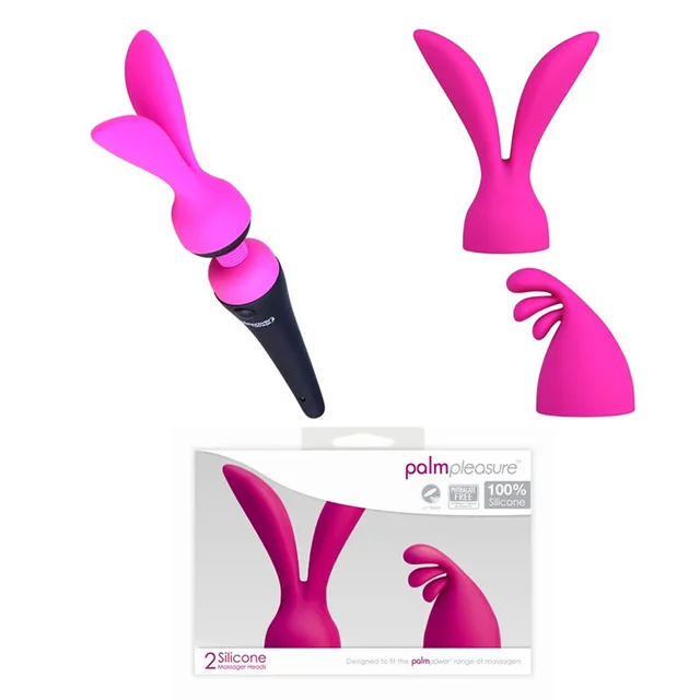 Palm Power pink two-fin silicone massager head with product card