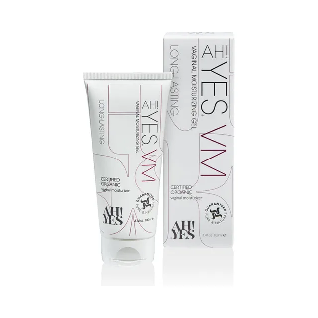 AH YES VM white 3.4 oz tube standing beside tall carton