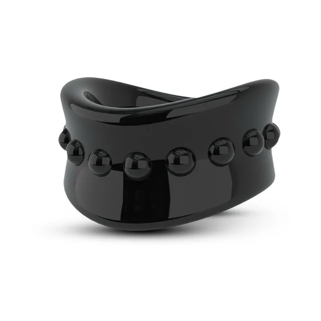 Close-up of black saddle stretcher with raised round studs