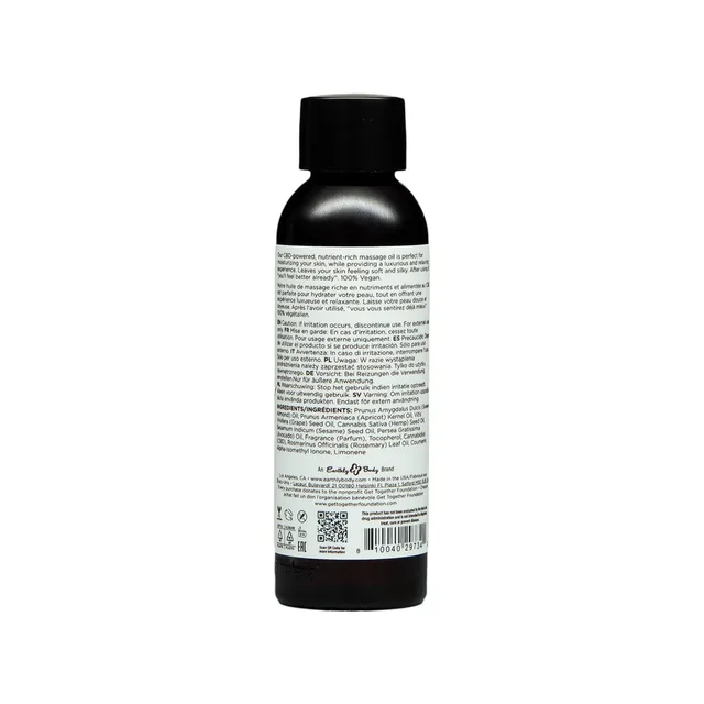 Back label of 2 oz Earthly Body Skinny Dip massage and body oil