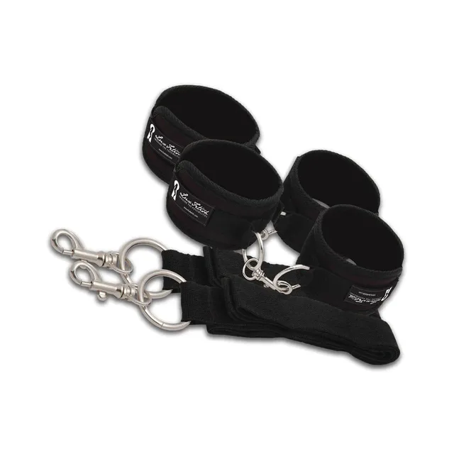 Close view of two padded black Lux Fetish restraint cuffs