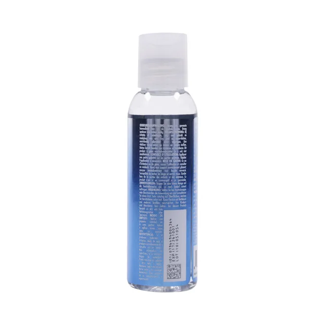 rear-left view of 2 oz Evolved Glisten bottle with multilingual label text