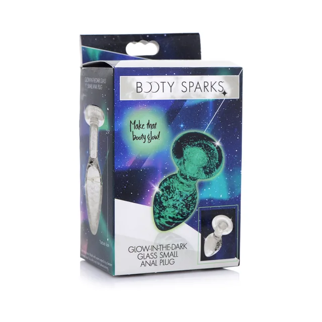 small clear Booty Sparks glass anal plug with green glow swirl pictured on box