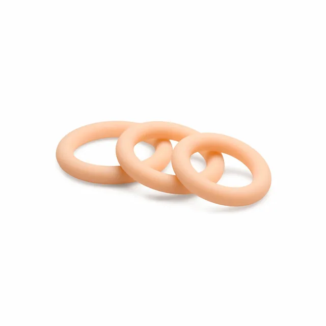 three light-tone Jock silicone rings arranged by graduated size