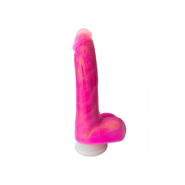 Front three-quarter view of pink Squiggler dildo on white suction base