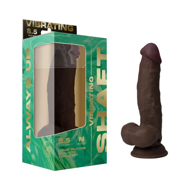 Shaft Model N mahogany silicone vibrator beside green windowed retail box