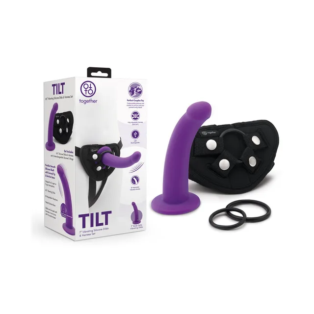 Purple Together Tilt vibrating dildo with black harness, two rings and retail box