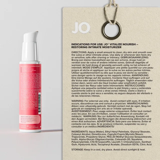 Rear label of JO Nourish bottle beside printed information card