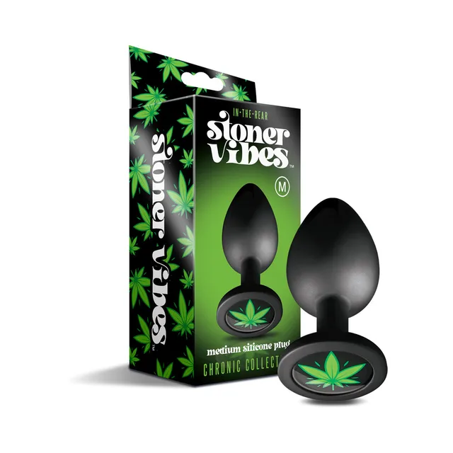 Medium black Stoner Vibes butt plug beside green Chronic Collection box