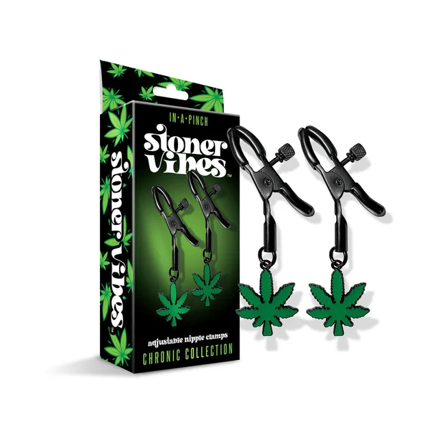 Pair of black adjustable clamps with green leaf charms beside retail box