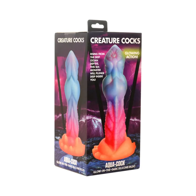 Creature Cocks Aqua-Cock multicolor glow dildo inside ocean-themed black retail box