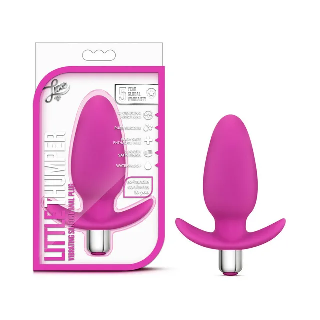 Luxe Little Thumper Pink vibrating plug beside white retail package