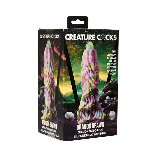 Creature Cocks Dragon Spawn multicolor ovipositor with stacked whorl textures beside illustrated retail box