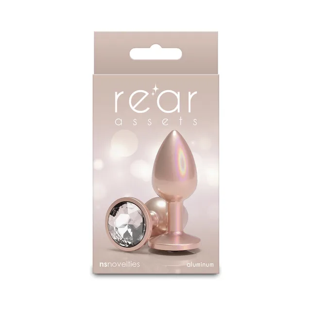 Small champagne Rear Assets aluminum plug with clear jewel base on box