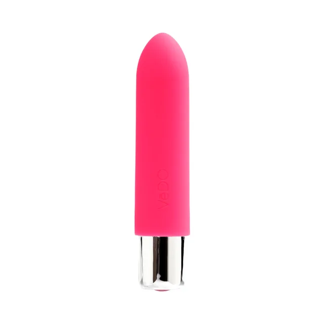 Foxy pink VeDO Bam Mini bullet vibrator upright front view with metallic base