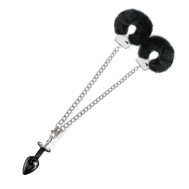 NIXIE medium black metal plug and furry handcuff set laid out with long silver chain