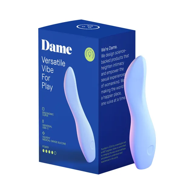 Periwinkle Dame Dip 2.0 curved vibrator standing beside blue retail box