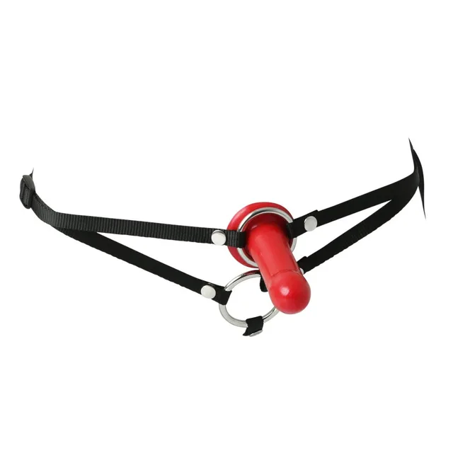 Black Sportsheets harness with metal rings and red Flare dildo