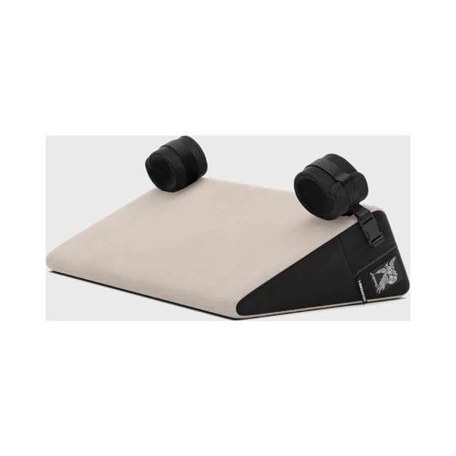 Cream Liberator Black Label wedge with black sides and cuffs at rear corners