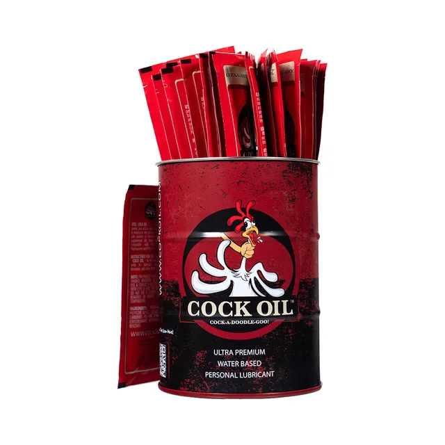 Red-and-black Cock Oil collector drum filled with 25 foil packets