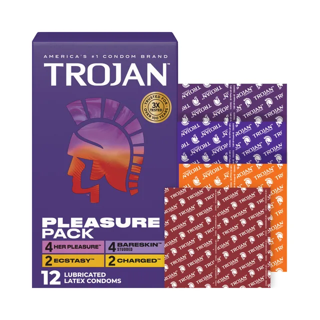 Trojan Pleasure Pack box beside blue purple and orange wrappers