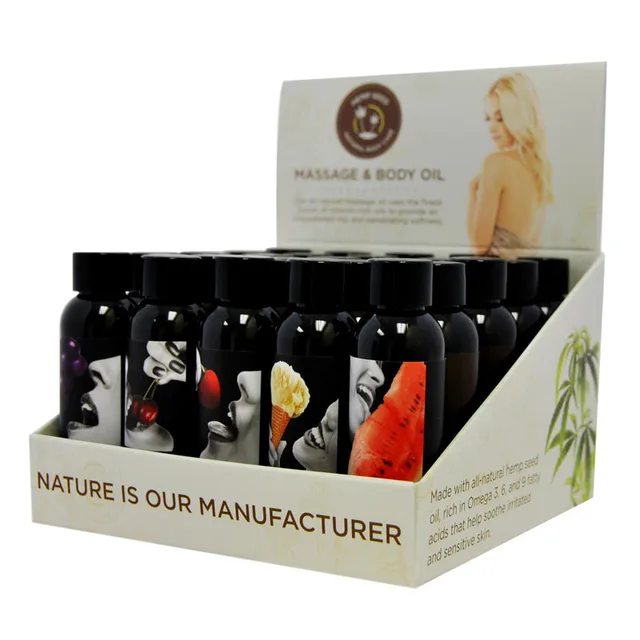 Earthly Body display tray filled with assorted 2 oz oil bottles