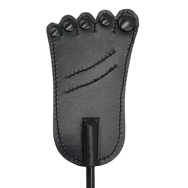 Rouge black leather foot-shaped riding crop close-up of the stitched five-toe tip