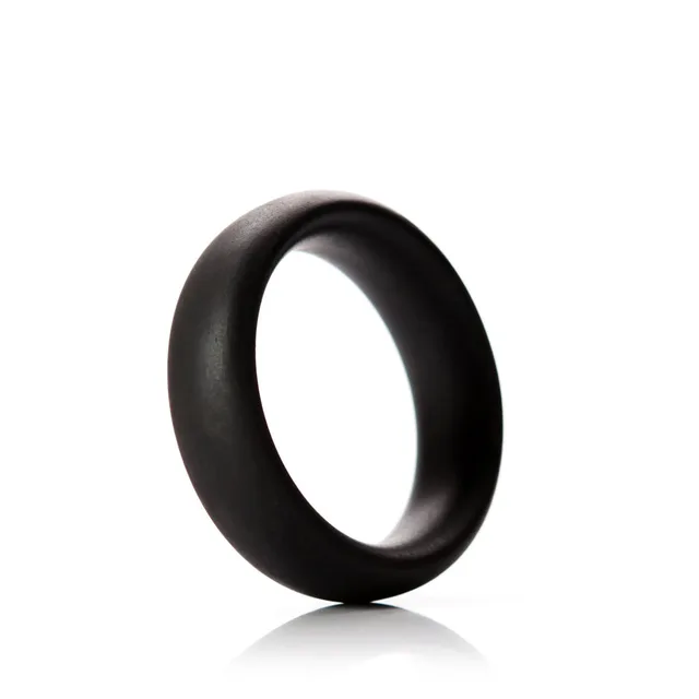 Single dark Tantus Beginner C-ring with broad rounded circular profile