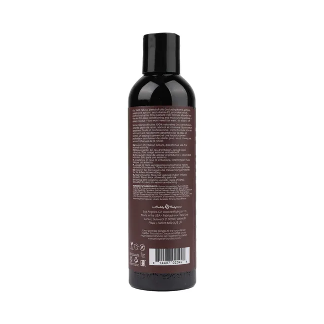 Back view of Earthly Body Skinny Dip black bottle with ingredient text