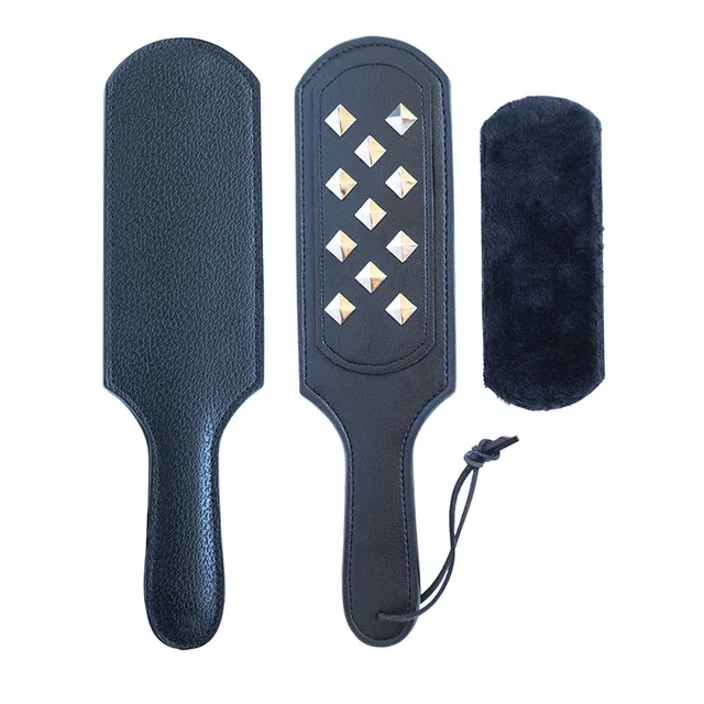 Black Kinklab Panamorphic paddle with studded face and plush cover