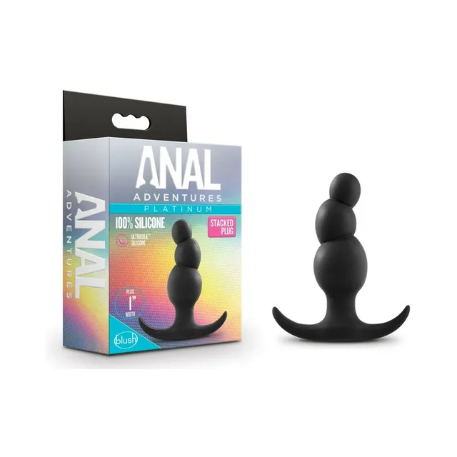 Anal Adventures black stacked plug beside its multicolor retail box