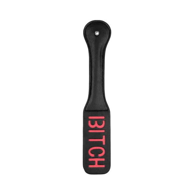 Black Ouch paddle with red BITCH lettering and rounded handle