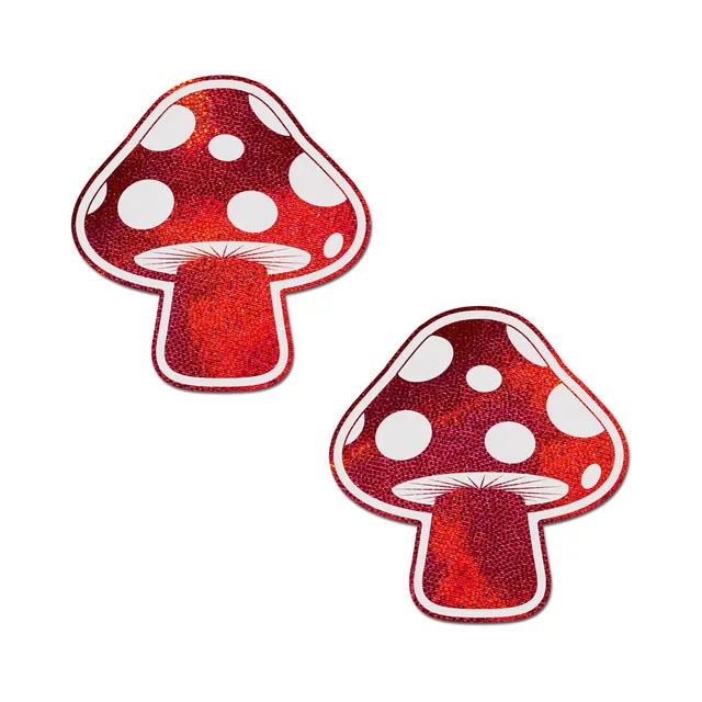Pair of red mushroom pasties with white spots