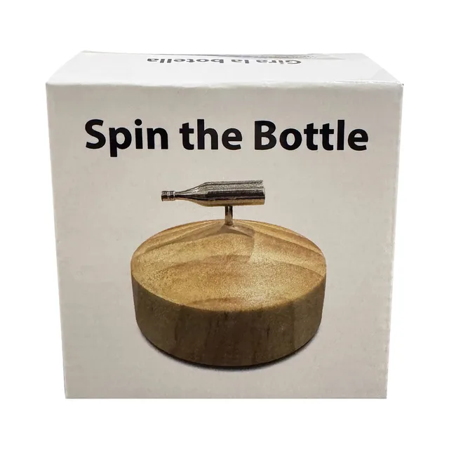 Spin the Bottle white game box with metal spinner on a round wood base