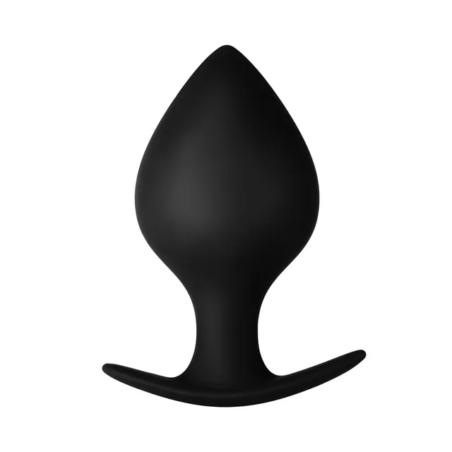 Front view of medium black F-63 spade plug