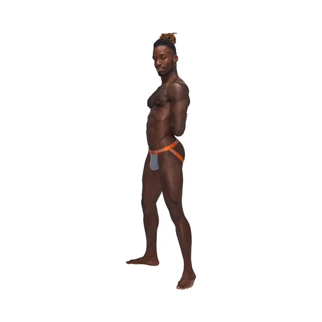 Full front view of model wearing gray and orange Casanova Uplift jock