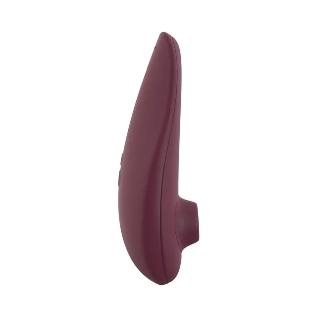 Side profile of Bordeaux Womanizer Classic 2 and raised air opening