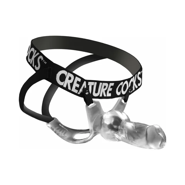 Creature Cocks Snow Wolf clear hollow strap-on with black elastic harness and metal clips