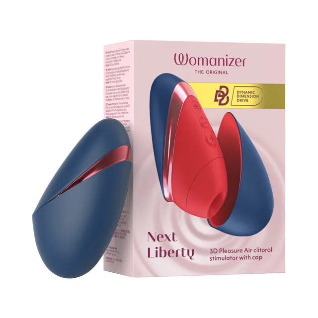 Womanizer Next Liberty blue and red clitoral stimulator with protective cover beside the pink retail box