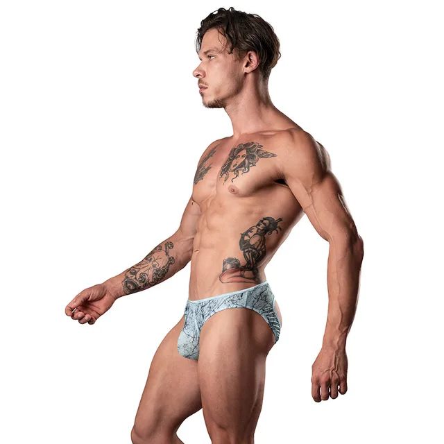 Male model wearing silver-blue Ultimate Duo Mini Moonshine size S/M