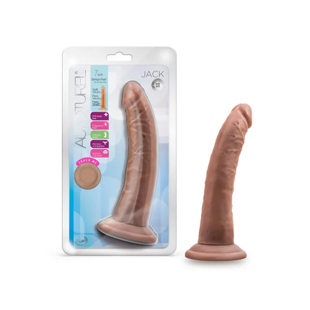 Tan Au Naturel Jack dildo beside clear retail package