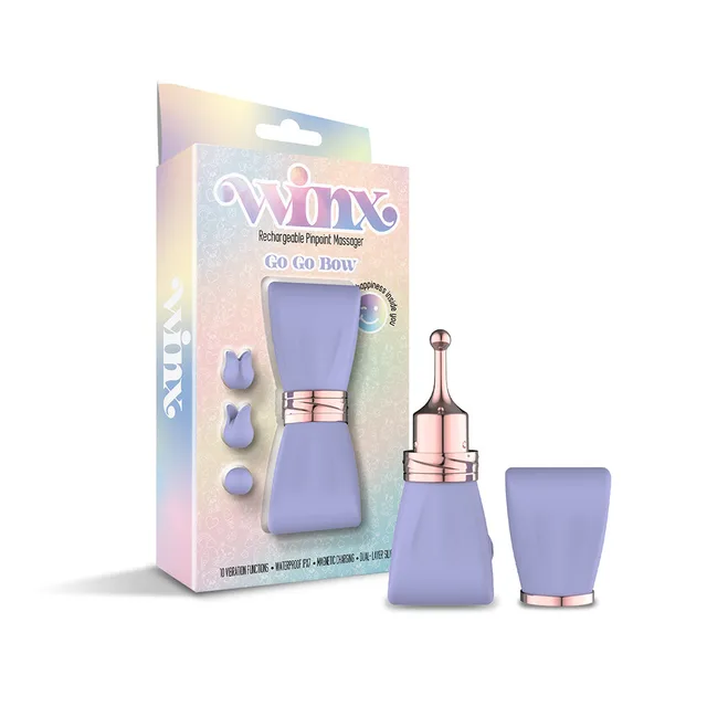 WINX GoGo Bow lilac massager with three attachments beside box