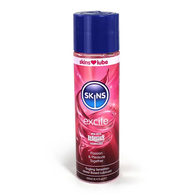 Skins Excite 4 oz lubricant bottle with pink label and blue cap